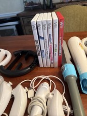 Wii Console with wii Sports, Games, Controllers and accessories – WOW!