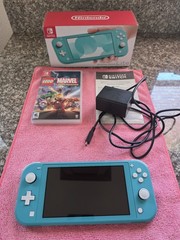 Nintendo Switch Lite Handheld Console – Turquoise With Game And Charger.