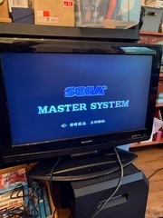 SEGA master system w/two 6 button controllers & phaser 4 games w/ box manual