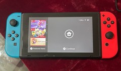Nintendo Switch Bundle – Includes Several Controllers, Disk, and Case Lot