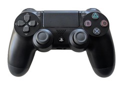 PS4 500GB Console, used in box, includes controller and cords, game NOT included