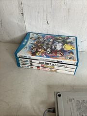 Nintendo Wii U 32GB Console Black W/ 4 Games Super Smash Bros, & Mario Kart 8