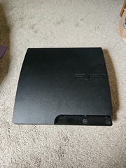 Sony PlayStation 3 Slim Launch Edition 320GB – Charcoal Black with controller