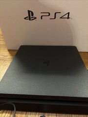 Sony PlayStation 4 Slim 1TB – 2 Controllers – and 28 Games(some PS3 and PS4)