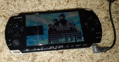 PSP-3001 Piano Black (works, no battery) + 1 GB Memory Stick Pro Duo (x2)