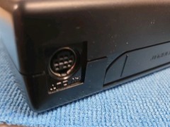Sega Nomad Console. With Box (no inserts). A/C adaptor. Battery holder missing..
