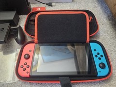 Excellent Condition Nintendo Switch Console W/ All Accessories & travel cases.